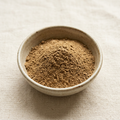 Illustrative image of turkey tail mushroom powder in a ceramic bowl