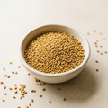 Illustrative image of dry alfalfa seeds in a ceramic bowl