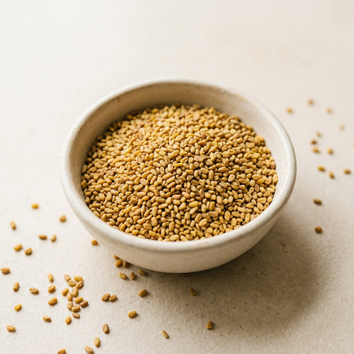 Illustrative image of dry alfalfa seeds in a ceramic bowl