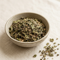 Illustrative image of dried holy basil tulsi in a ceramic bowl