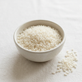 AI-generated illustration of uncooked sushi rice in a ceramic bowl