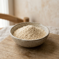 Illustrative image of lion's mane mushroom powder in a ceramic bowl